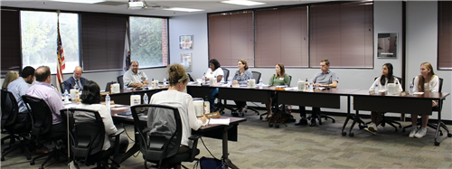 Board members sitting at table
